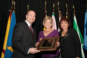 Conner, with Diane Blackwelder, Alpha Chi Omega National president, and Jane Sutton, National Panhellenic Conference chair