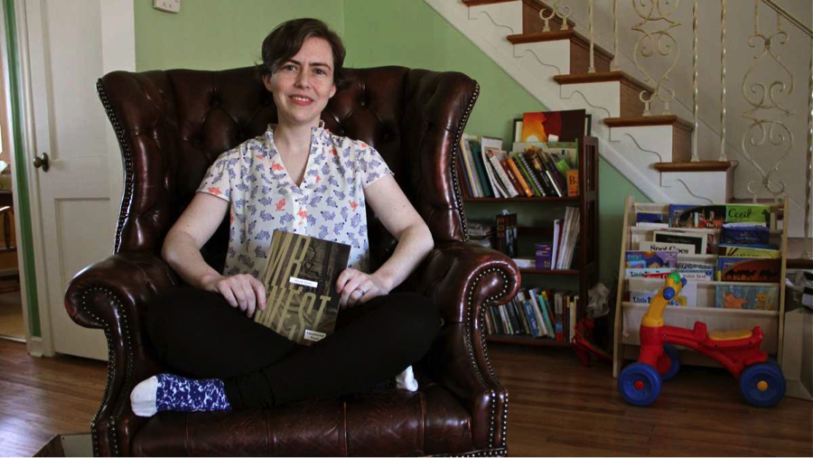 Blake at home with her first book, Mr. West, outside Philadelphia. Photo courtesy Emma Lee/WHYY