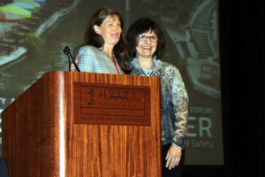 Dr. Geralyn Altmiller (L) receives the Linda Crownenwett QSEN Leadership Award from Mary Dolansky, RN, PhD, Director of the QSEN Institute at Case Western Reserve University